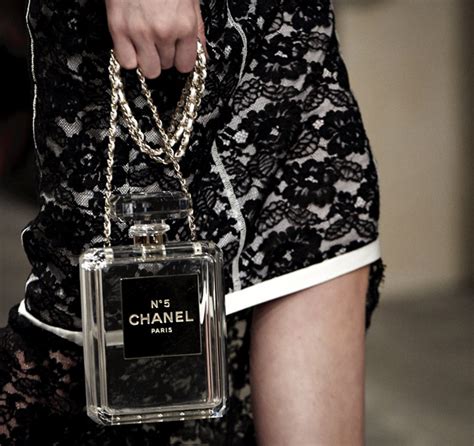 chanel 5 bottle clutch.